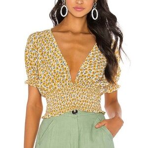 Faithfull the Brand Yellow Smocked Flutter Sleeve Crop Top